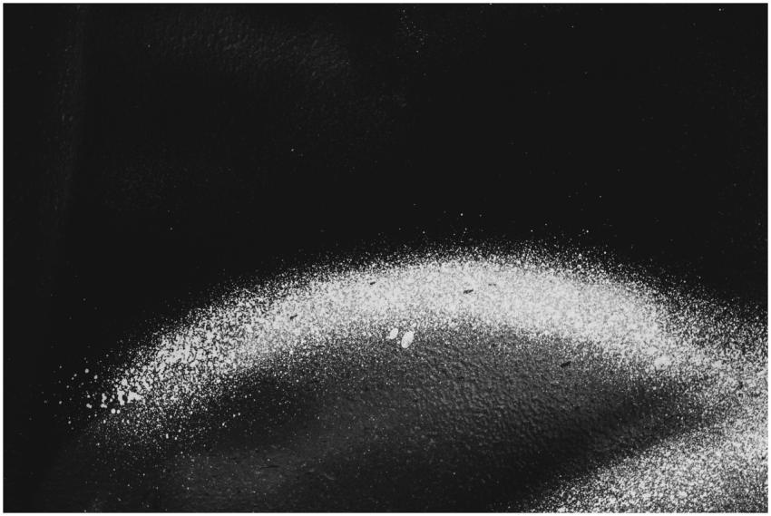 Monochrome abstract background with a textured spa