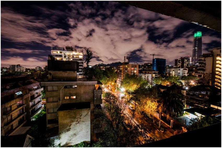 Dramatic night view of Santiago's skyline with lit
