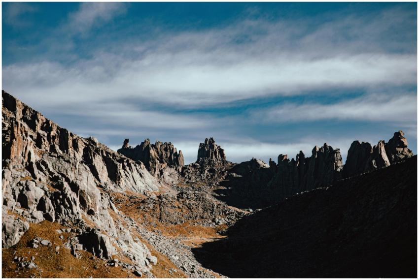 Explore the stunning rocky ridges under a vibrant