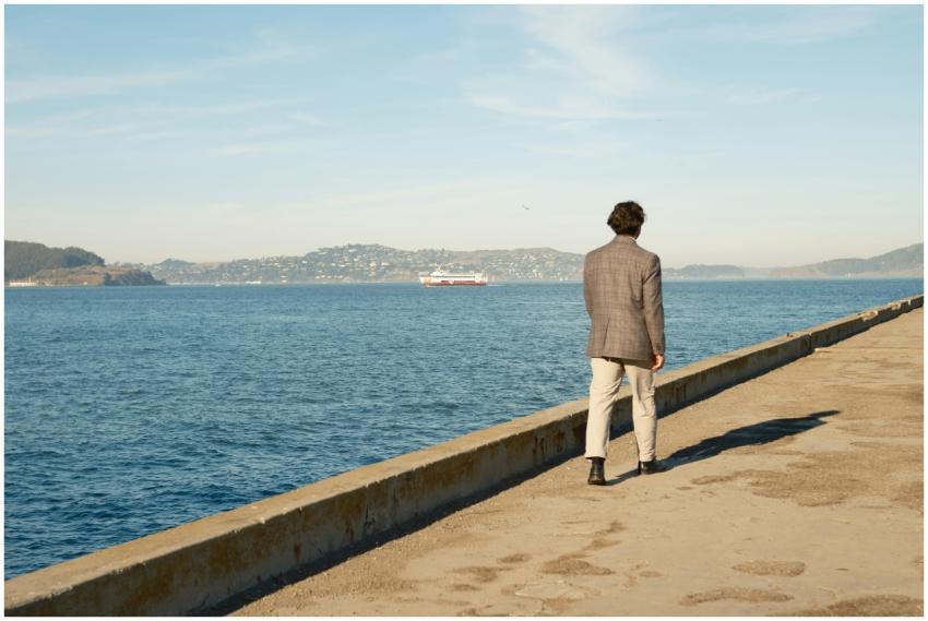 Man gazing at ocean scenery from pier in Los Angel