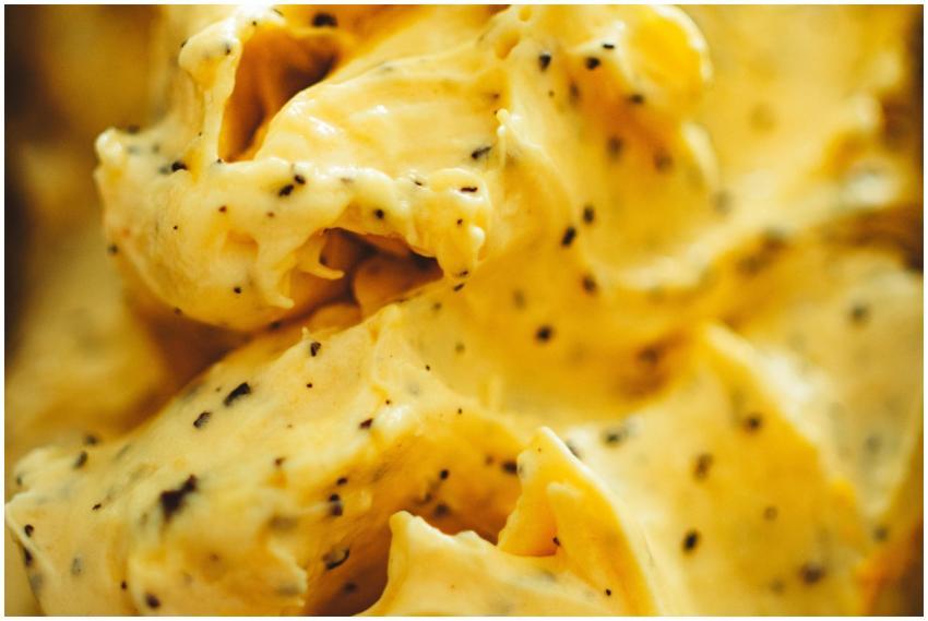 Rich and creamy yellow ice cream with visible vani