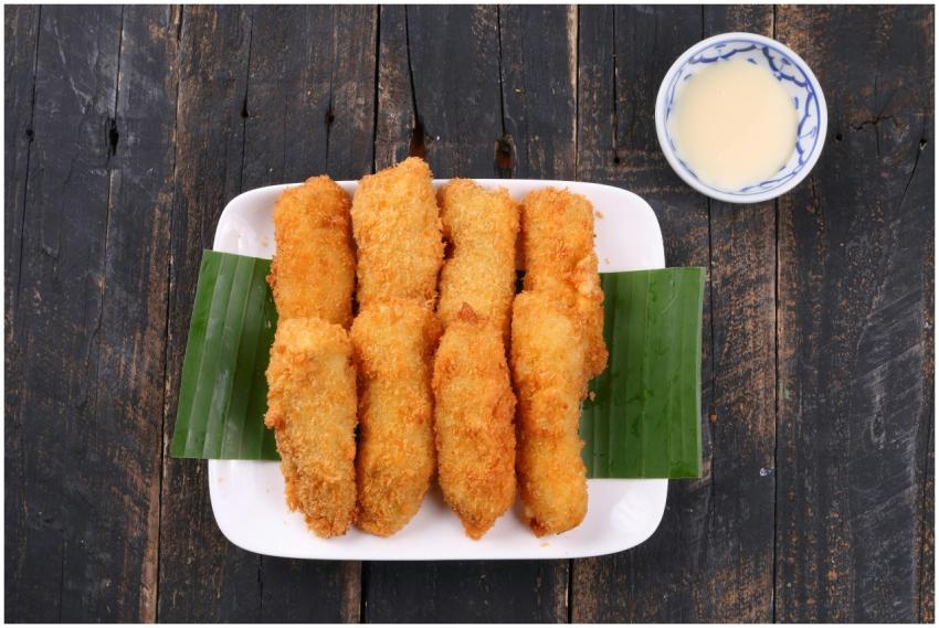 Delicious crispy fried bananas served on a plate w