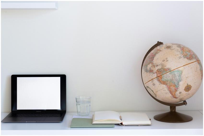 Creative composition of computer with empty screen