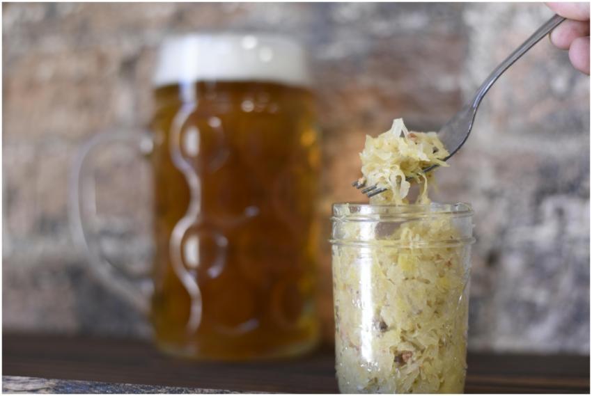 A rustic setting featuring a frothy beer mug and s