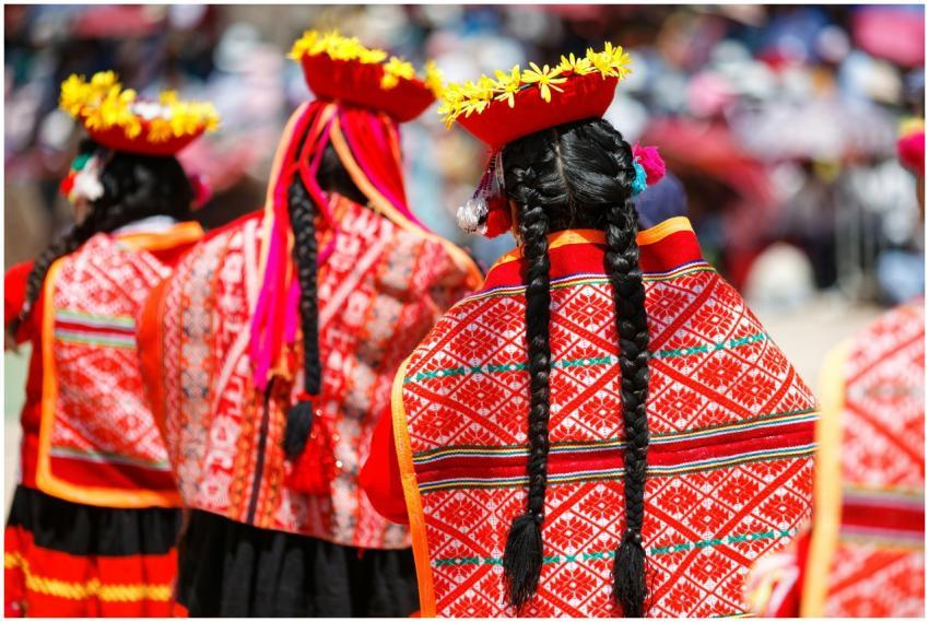 Colorful Quechua attire highlights cultural festiv