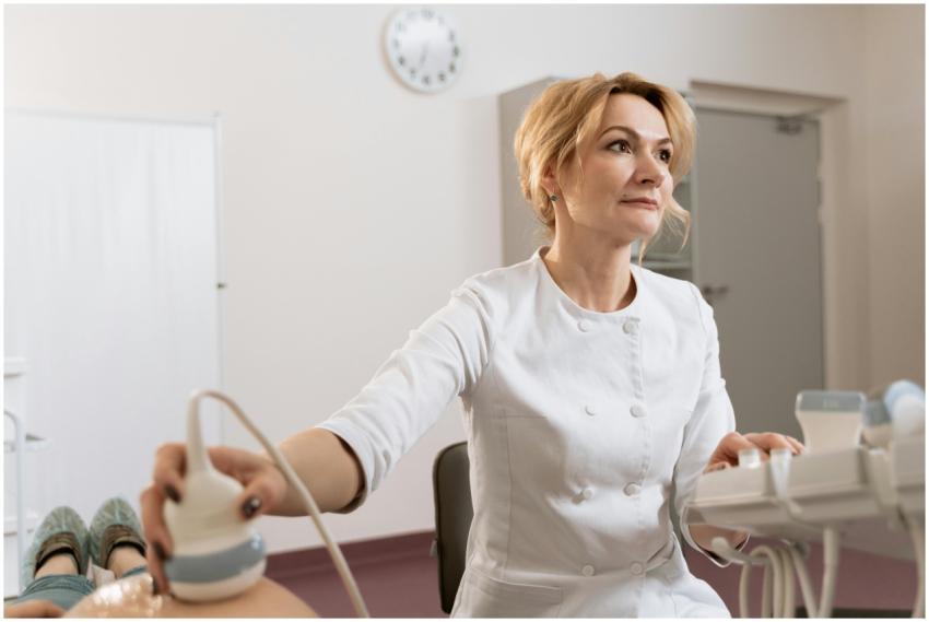 A female doctor performing an ultrasound in a medi