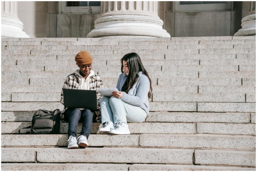 Full length cheerful young multiracial female stud