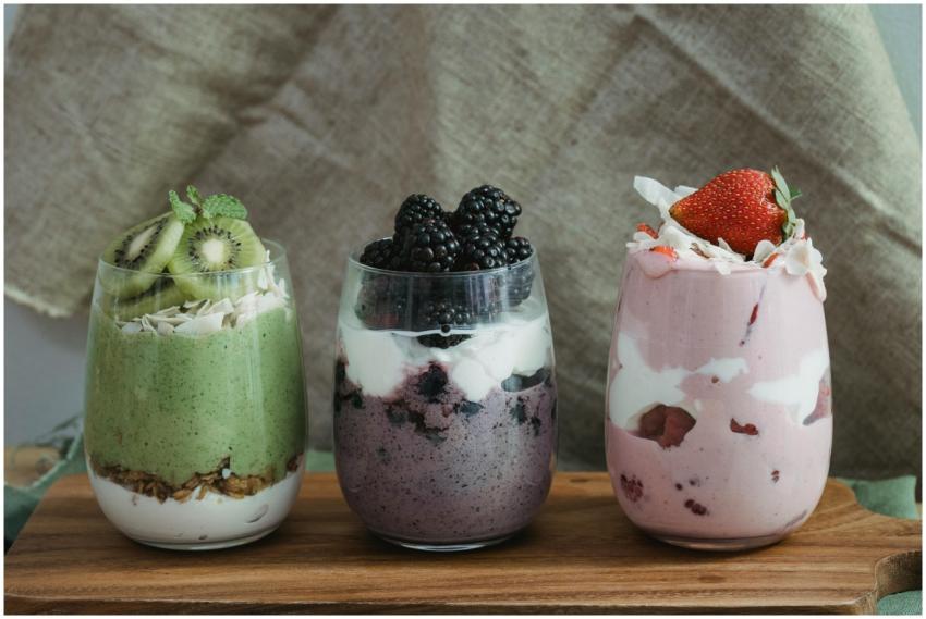Delicious yogurt parfaits with kiwi, blackberries,