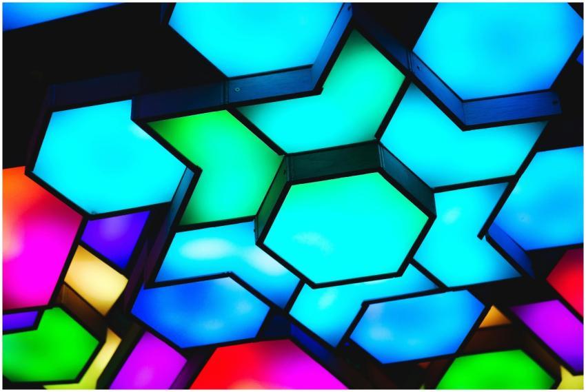 A colorful display of geometric ceiling lights cre