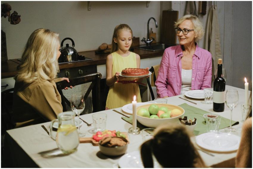 A joyful family dinner with cake and wine, featuri