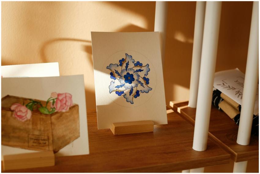 Hand-painted greeting cards with floral designs on