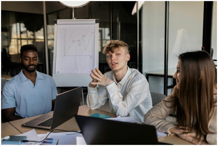 Three diverse colleagues engaged in a business str