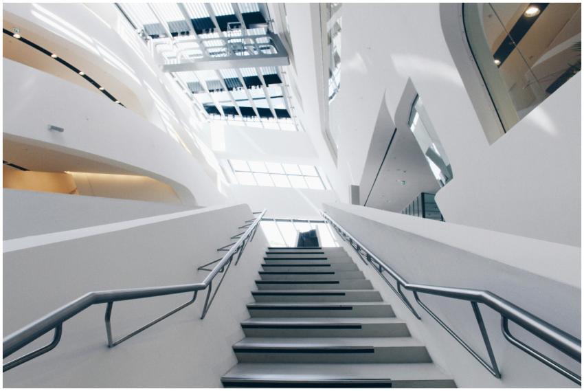 Low angle view of a sleek, modern staircase with g