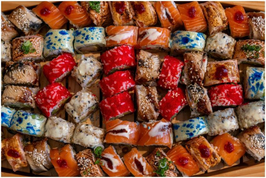 An overhead view of a colorful assortment of sushi