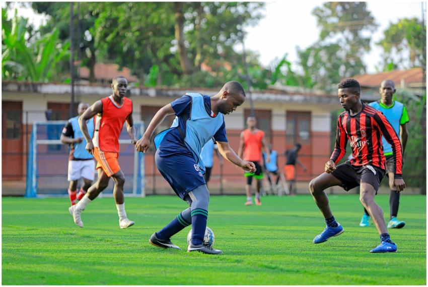 A group of young athletes training on a soccer fie