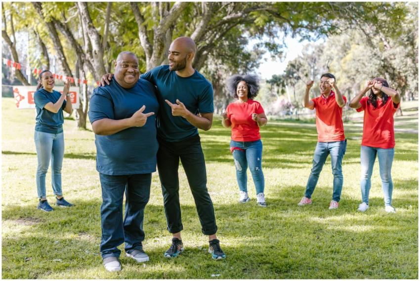 Group of adults engaging in fun team building acti