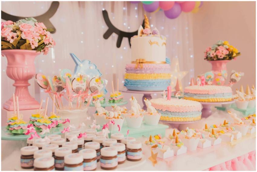 A vibrant unicorn-themed birthday party setup with