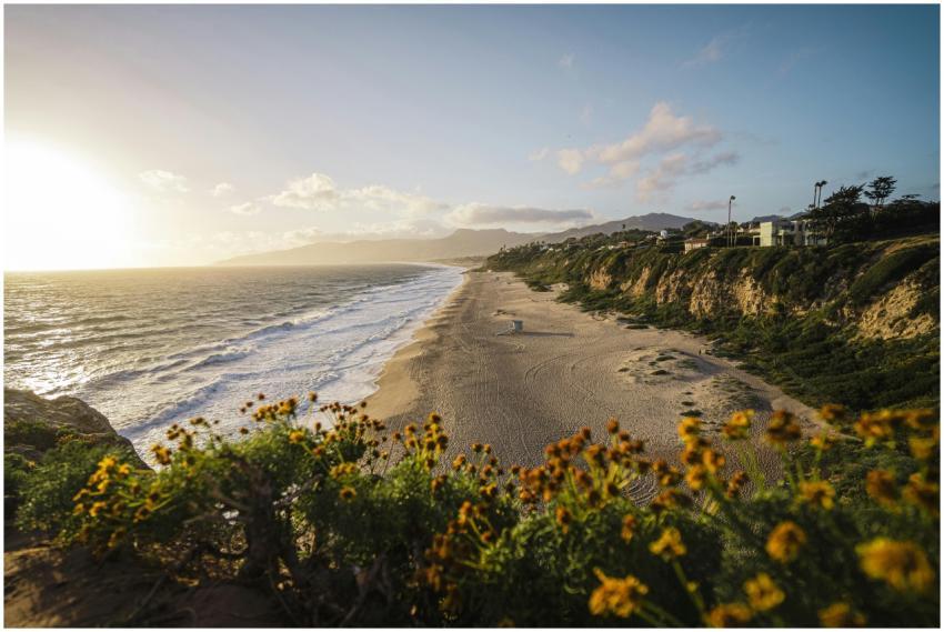 Captivating view of Malibu beach at sunset with wa