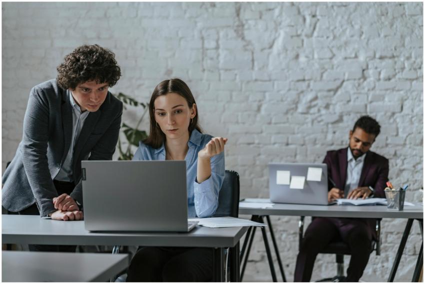 Three professionals working together in a contempo