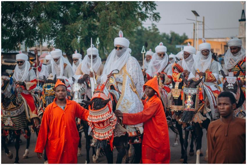 Vibrant cultural parade featuring adorned horses a