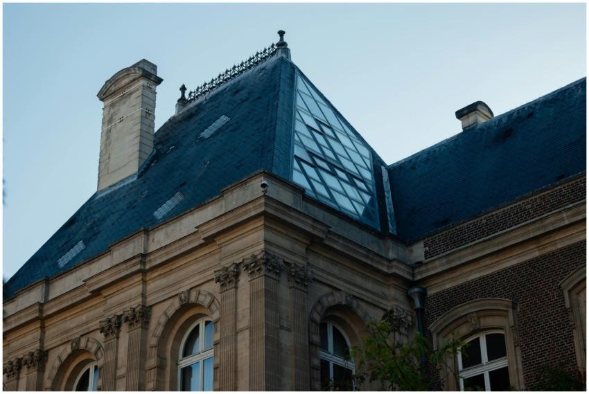 A classic French building featuring traditional st