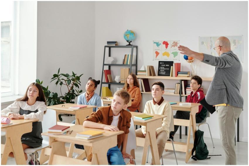 A diverse group of students attentively participat