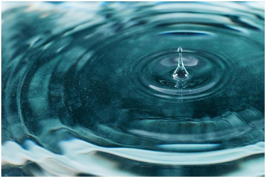 A mesmerizing close-up image of a water droplet cr