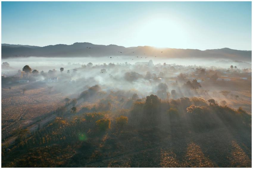 Breathtaking aerial view of a foggy valley during