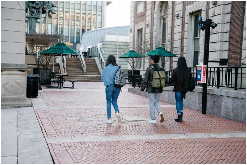 A group of students leisurely walking on a univers