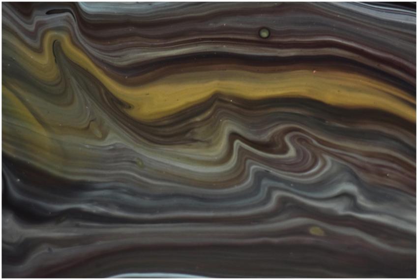 A colorful abstract painting with flowing swirls a