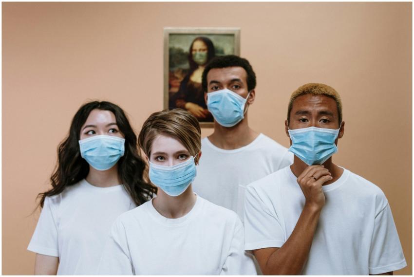 Group of diverse people wearing masks with Mona Li