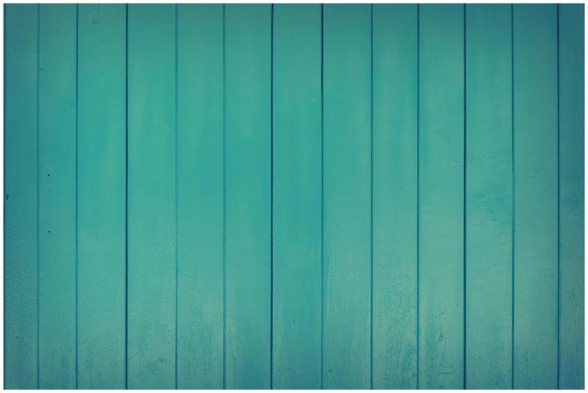 A vibrant teal wooden panel texture perfect for de