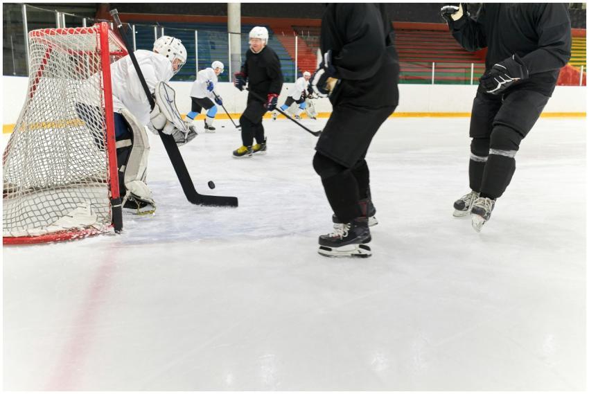 Intense ice hockey match with players in action on