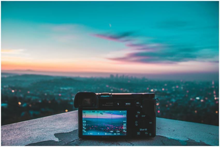 Camera capturing a stunning cityscape and colorful