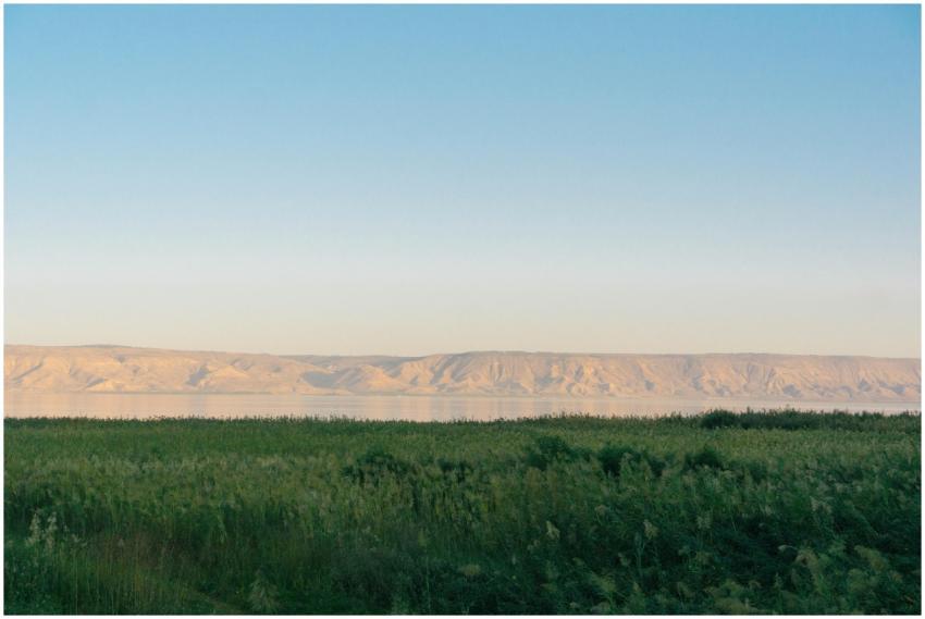 Peaceful view of Lake Tiberias with grassy foregro