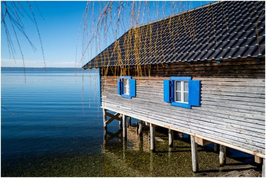 Charming rustic cabin on stilts by a tranquil lake