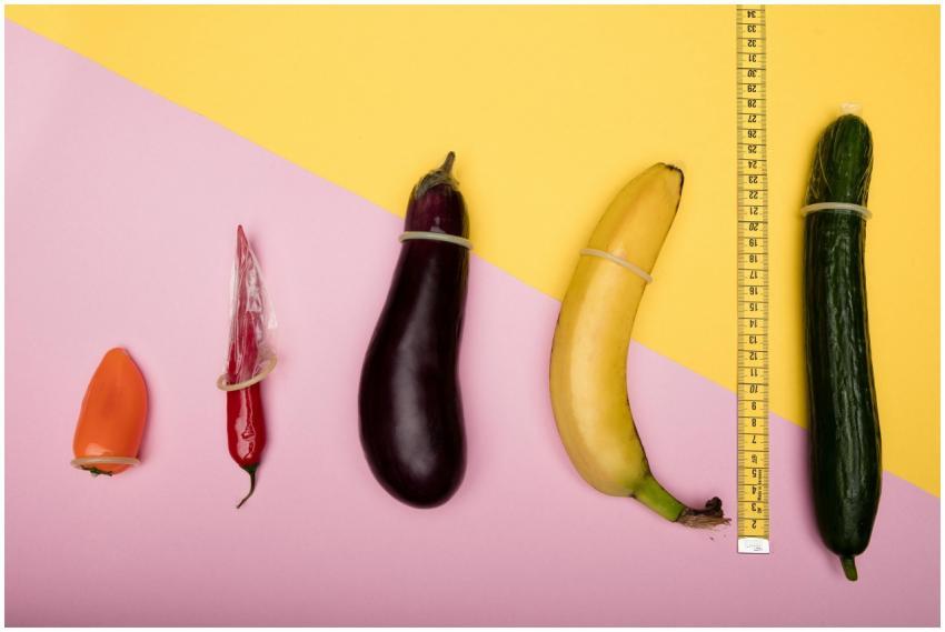 Fun conceptual photo comparing sizes of fruits usi