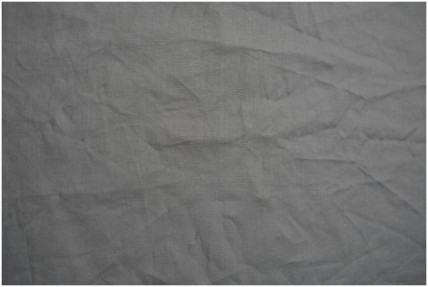 Wrinkled gray fabric texture ideal for backgrounds