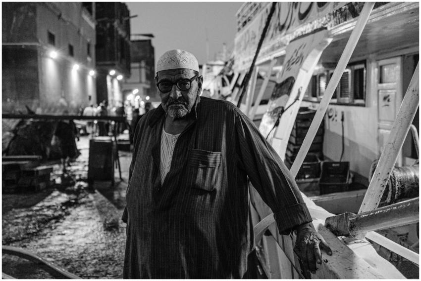 Dramatic black and white portrait of a fisherman o