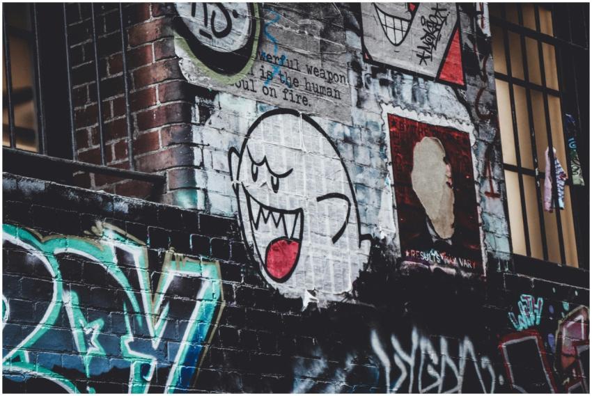 Vibrant street art mural showcasing a cartoon ghos