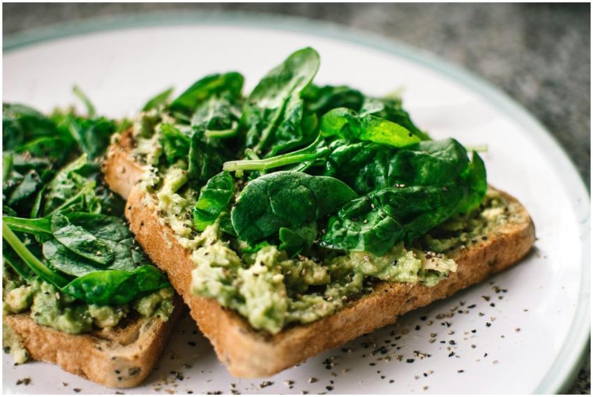Close-up of a homemade avocado and spinach sandwic