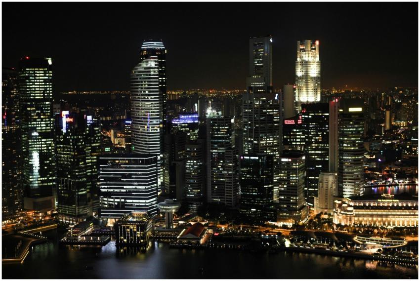 A breathtaking view of a city skyline at night wit