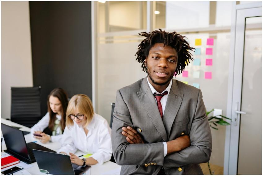 Professional business leader posing confidently in