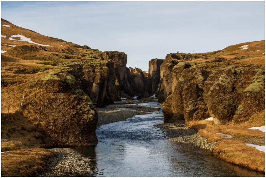 Scenic view of a dramatic canyon with a winding ri