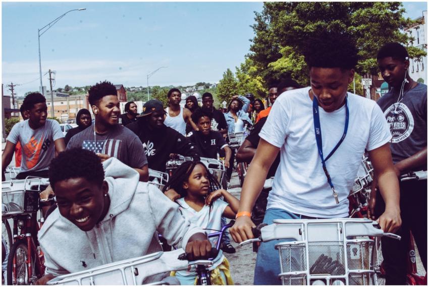A diverse group enjoying a vibrant bike ride toget