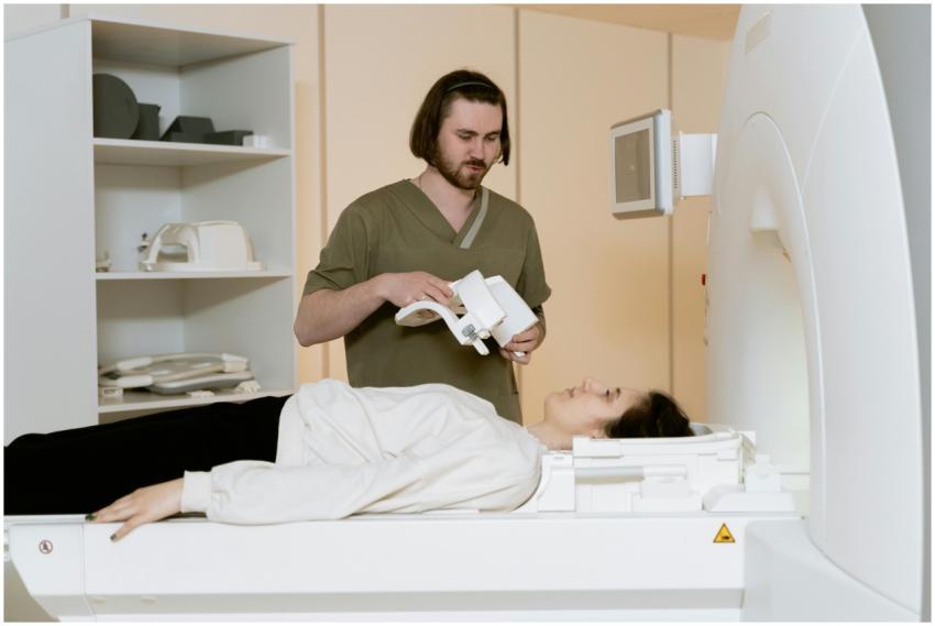 Healthcare worker assisting a patient during an MR