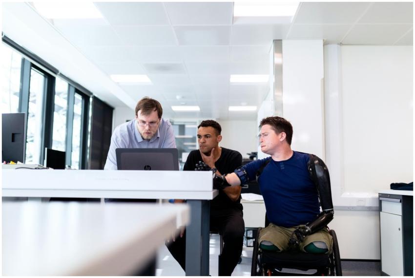 Team of engineers and designers working on prosthe