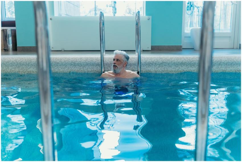 Elderly man enjoying a peaceful moment in an indoo