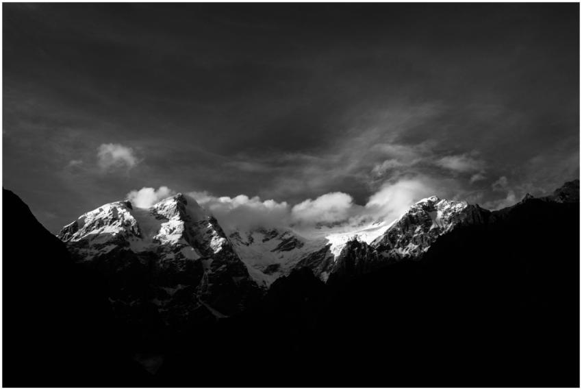 Stunning black and white photo of snow-capped moun