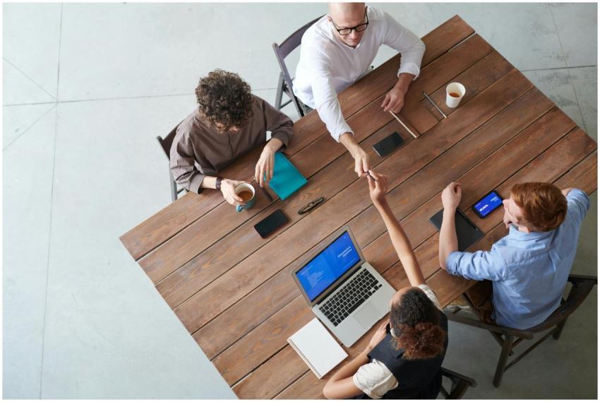 High angle view of a collaborative team meeting in